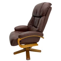 Light wood framed reclining swivel armchair upholstered in real leather.