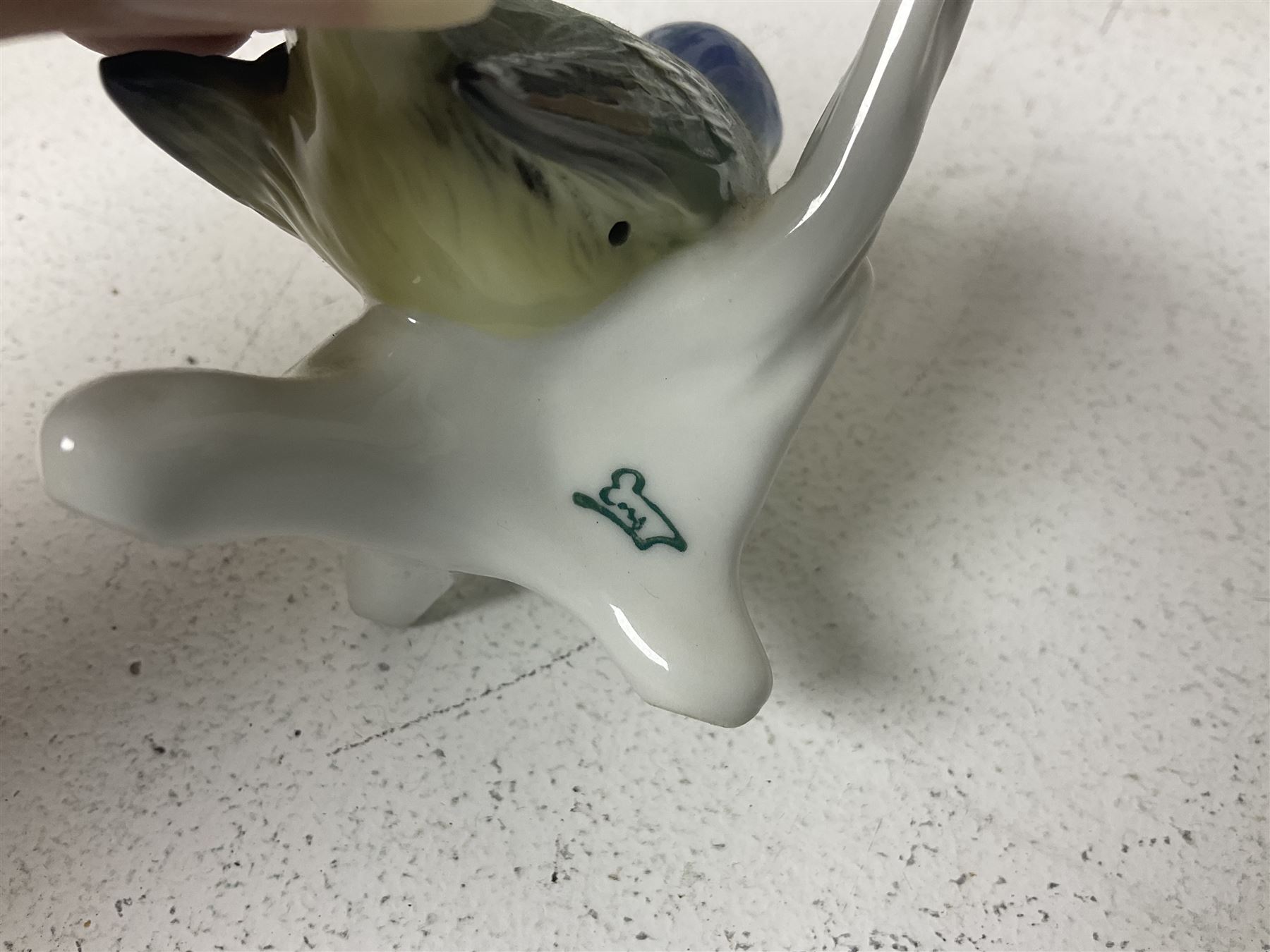 Seven Karl Ens bird figures, including barn owl, eagle owl, blue tit, budgerigar etc, all with mark beneath, tallest H17cm 