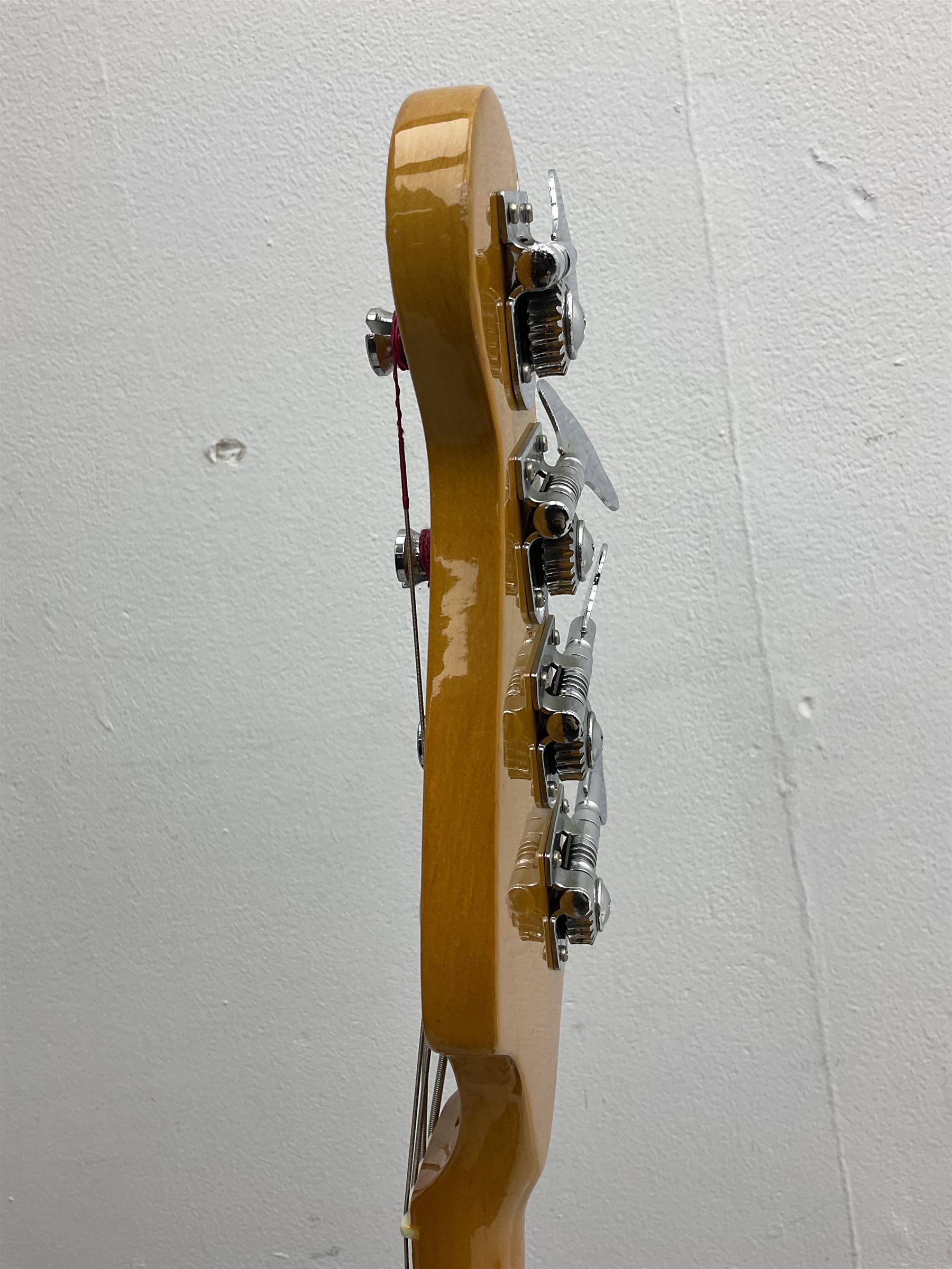 Richwood electric bass guitar in blue, cream and natural finish L117cm; in Fender soft carrying case; together with Behringer Thunderbird Bx108 amplifier date code 0 4 11.