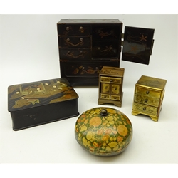  Japanese Meiji period lacquered hinged box, gilded and painted with figures in interior setting, Japanese lacquered travelling chest, H23.5cm, 19th century Japanese lacquer circular pot and cover decorated with hand painted and gilded floral motif and two small chests (5)  