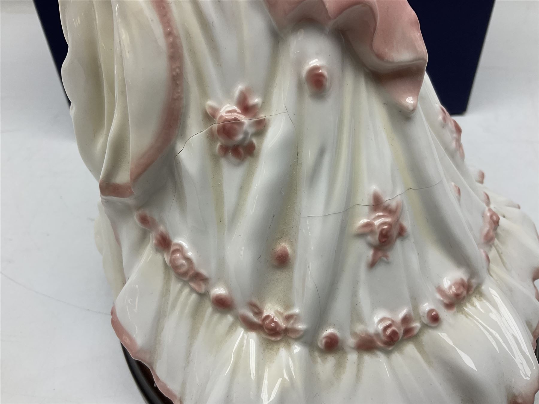 Three Royal Worcester figures, comprising Glyndebourne, with original box, Royal Worcester Special Even 1998 Elizabeth, with certificate and original box, and In Celebration of the Queens 80th Birthday 2006 