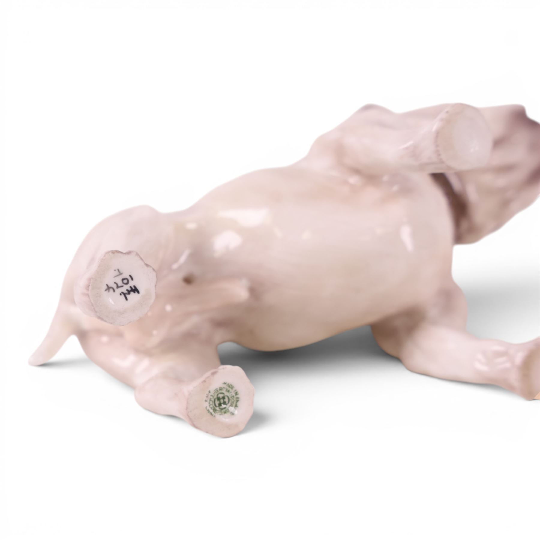Two Royal Doulton Brindle bulldogs,1047, together with a pair of Beswick Bosun bulldogs and two others 
