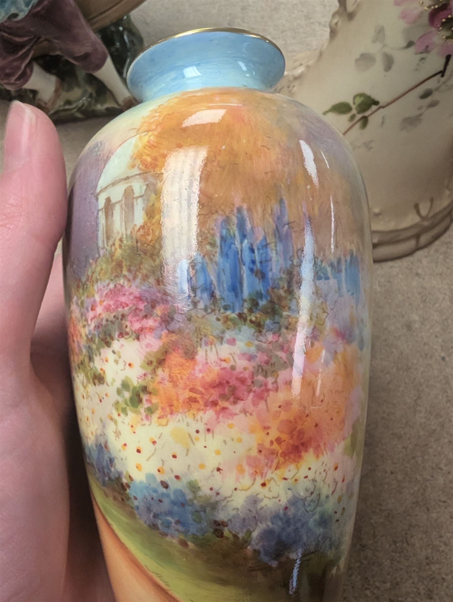 Royal Doulton Kew Gardens vase, signed J Price, together with a Royal Worcester blush ivory three piece cruet set, a Ernst Wahliss ewer, etc 