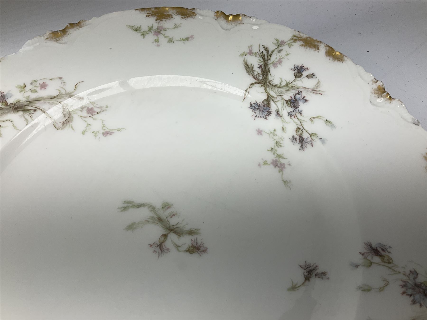 French Haviland Limoges part dinner service, decorated with floral sprays and gilding, to include two lidded tureens, thirteen plates, oval serving platter, etc, all stamped H & Co Made in France for James Green & Nephew (17) 