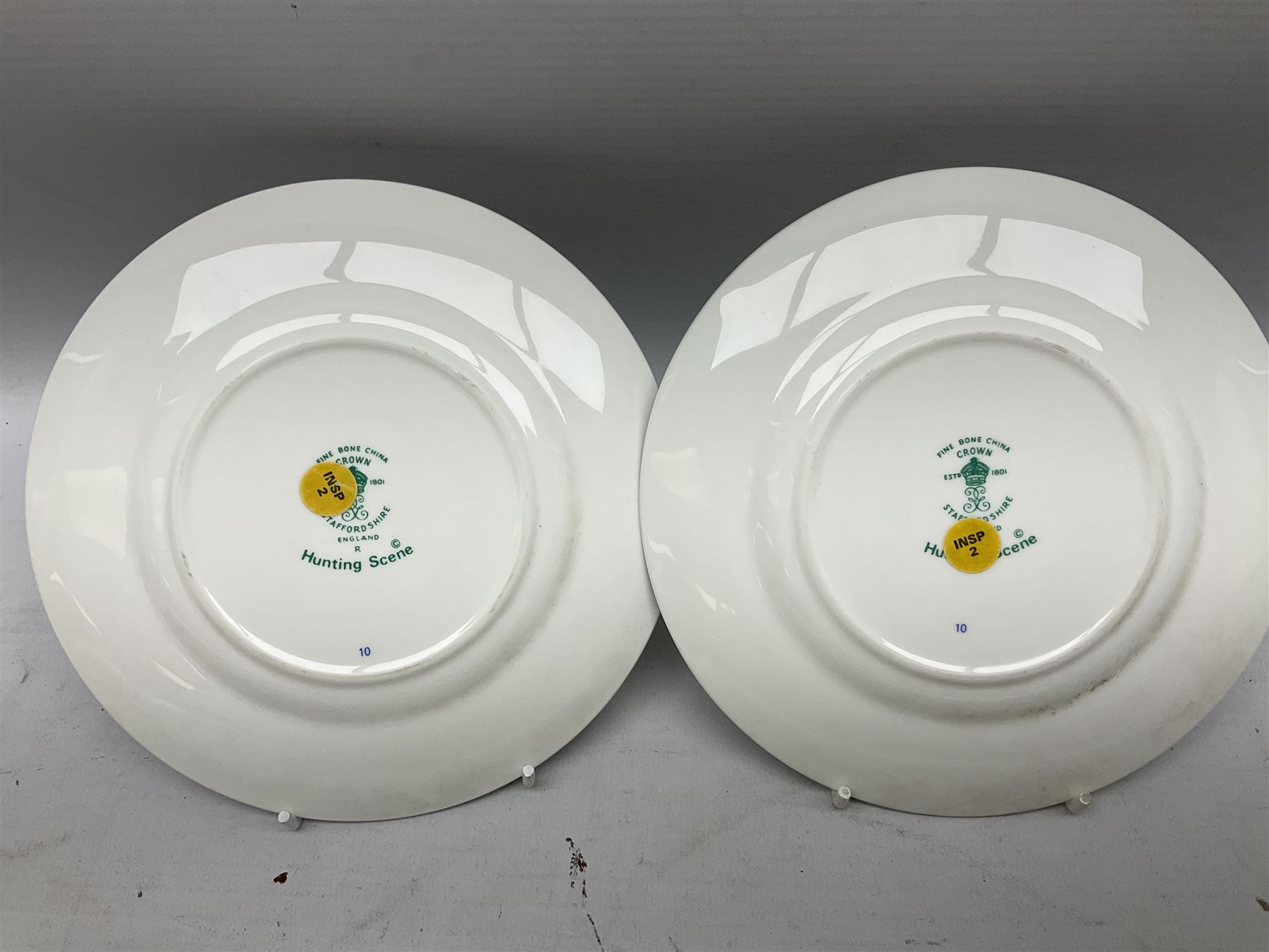 Nine pieces of Coalport and Crown Staffordshire Hunting Scene porcelain including three-piece condiment set, pair of pin dishes, bowl, vase etc