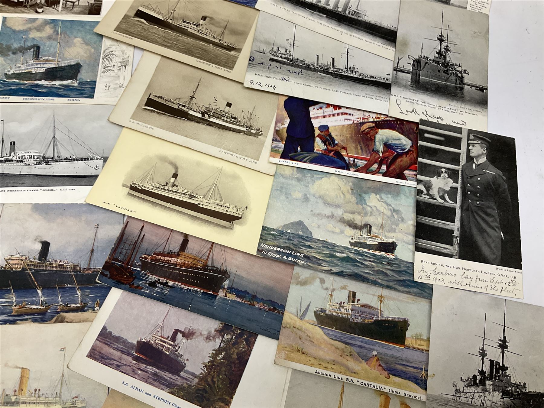 Sixty-five early 20th century postcards of passenger liners including White Star, Red Star, Atlantic Transport, Anchor, Cunard, Henderson, Booth, Union Castle, Holland America, Lamport & Holt, P. & O., New Zealand, Canadian Pacific, British India etc; and ten Edwardian postcards of Naval warships and officers (75)