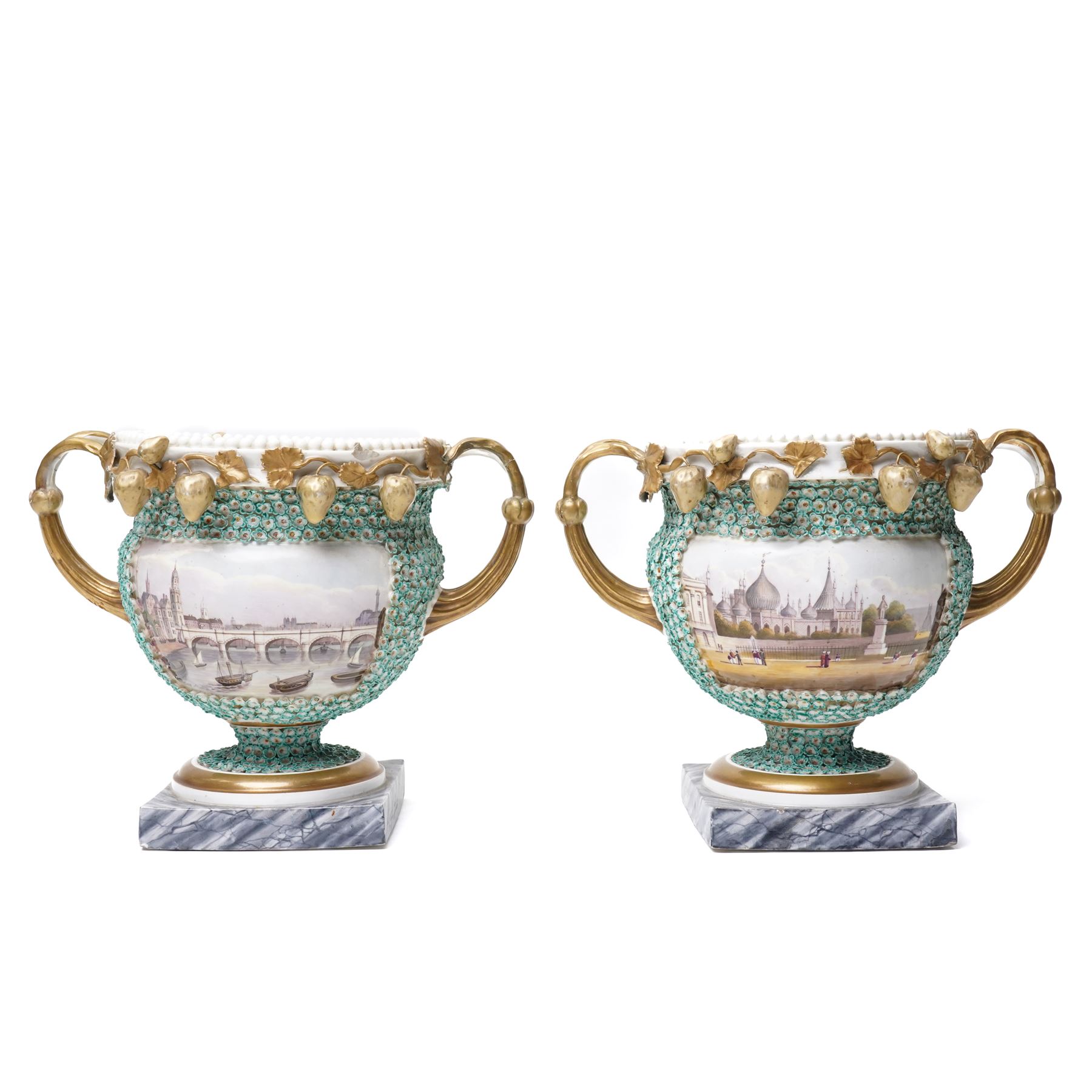 Pair of 19th century Grainger Lee & Co Worcester urns, c1820s-1830s, hand-painted with views of 'Near London Bridge' and 'Brighton Pavilion' upon a ground of encrusted forget-me-not decoration, the beaded rim with twin naturalistically formed handles, leading into vines moulded with strawberries in high relief, the pedestal painted to imitate marble, painted marks to base, H20cm