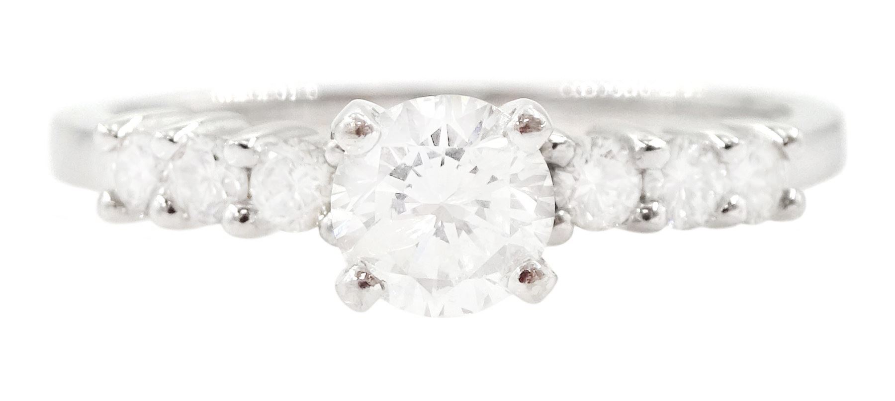 18ct white gold diamond ring, single stone round brilliant cut diamond of approx 0.50 carat, with diamond set shoulders, stamped 750