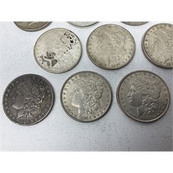 Eight United States of America silver Morgan dollar coins, dated 1882, 1884 O, 1884, 1885, two 1886, 1889, 1890 and a 1925 peace dollar