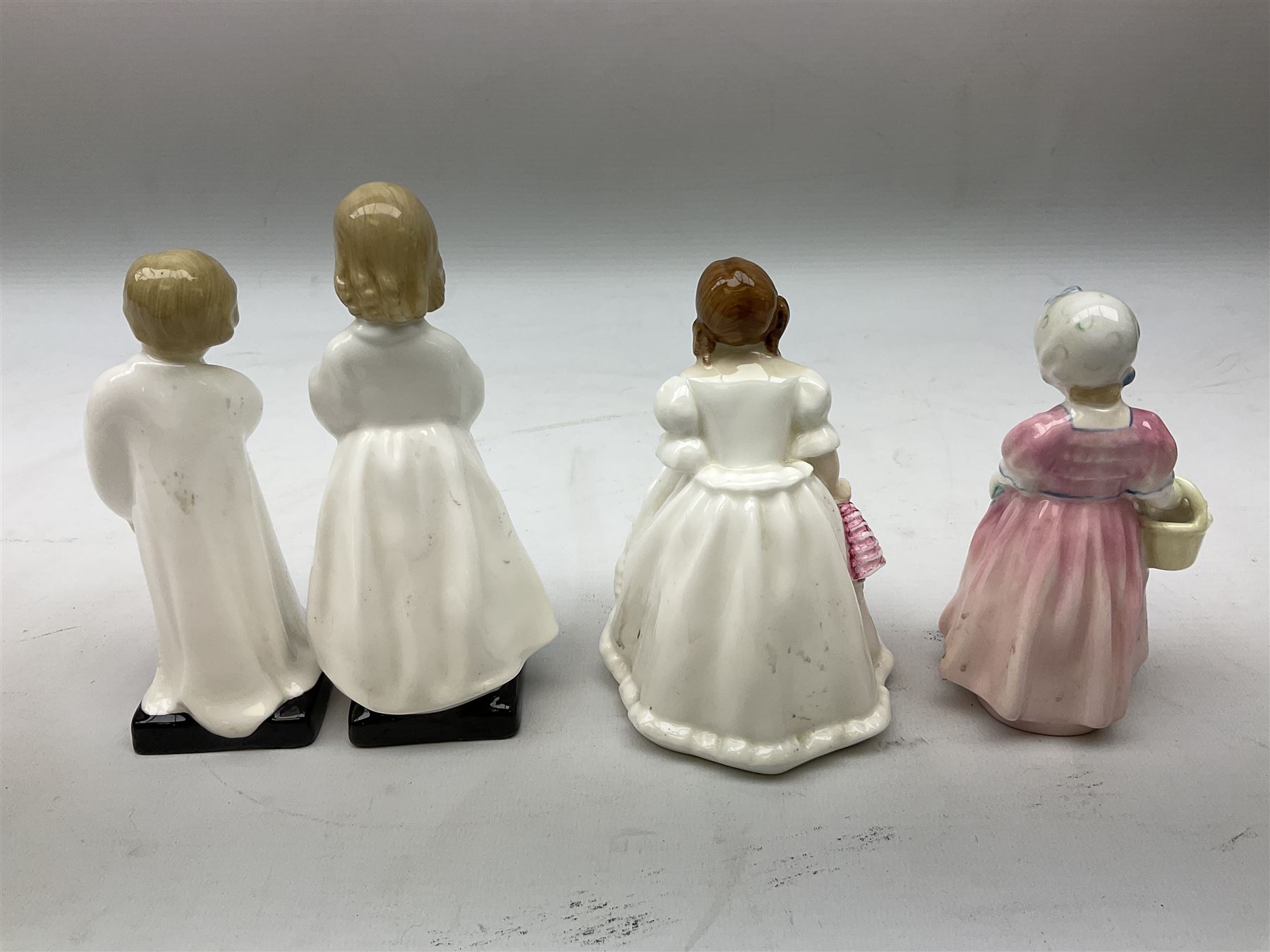 Royal Doulton figures, comprising Lynsey HN3043, Tinkle Bell HN1677, Debbie HN2385, Bedtime HN 1978, Darling HN1985, Adrienne HN3159 and Leading Lady HN2296