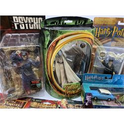 Assorted action figures - five Pirates of the Caribbean; five Indiana Jones; one Lord of the Rings; one Psycho; and four Harry Potter; all in unopened blister packs; together with a Harry Potter die-cast model of Mr. Weasley's Ford Anglia, boxed (17)