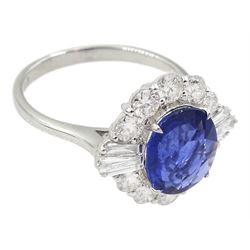 18ct white gold oval sapphire, tapered baguette cut and round brilliant cut diamond cluster ring, stamped 750, sapphire approx 2.80 carat, total diamond weight 1.00 carat
