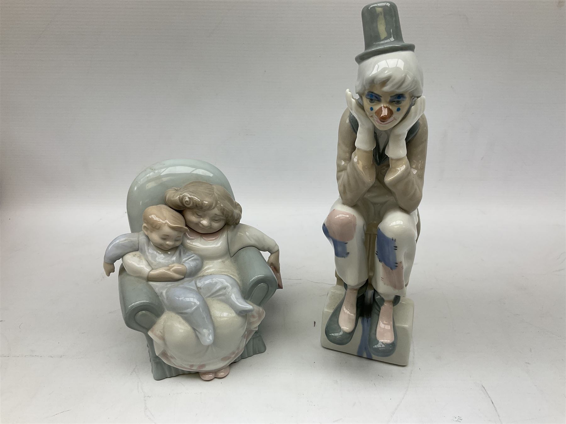 Collection of Nao figures, to include 'Moment with Mummy' no.1429, 'Stories with Grandma' no.1512, 'A Hug of Love' no.1467, together with fourteen further Nao figures and a Cascades clown figure