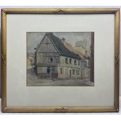 Frank Ormrod (British 1896-1988): Castle Ruins overlooking a Street, watercolour signed and dated 1921, 29cm x 36cm 