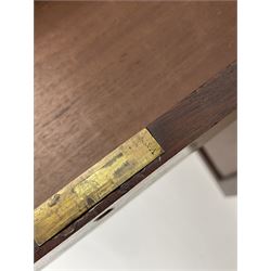 Early Victorian figured mahogany dressing cabinet, the raised shell and scroll carved back lifts to reveal rectangular easel mirror with mahogany band, flat rectangular top with tooled leather inset, slide at each side with matching leather inset, full width drawer above cupboard enclosing a series of five drawers, turned front supports, panelled front, sides and back