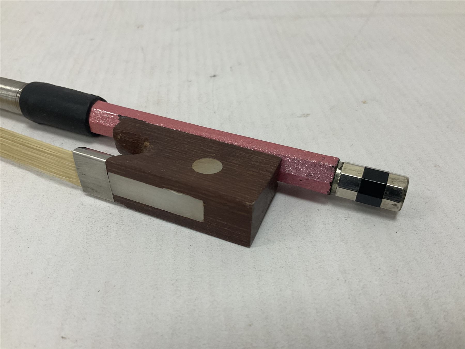 Zest full size pink violin, with a solid wood body and maple head, with matching pink bow and two further bows, in a hard case Length 60cm