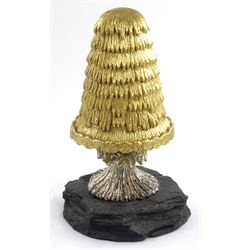Christopher Nigel Lawrence limited edition silver and parcel gilt surprise mushroom, the textured domed cover opening to reveal two elves decorating a semi-precious gem set Christmas tree, upon a slate base, no 100/250, hallmarked Christopher Nigel Lawrence, London 1980, overall H9cm