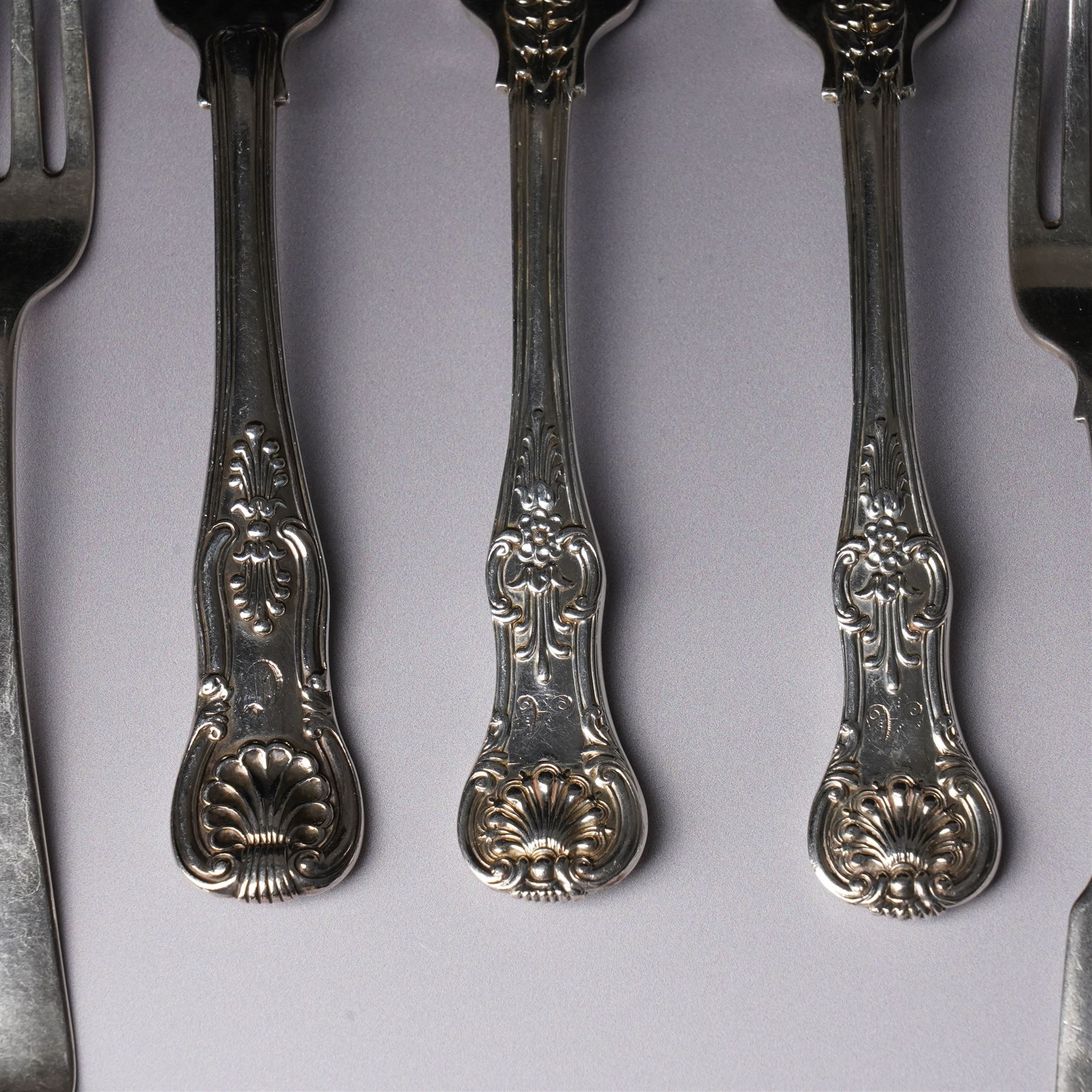 Pair of George IV silver fiddle pattern dessert forks, London 1824, another pair London 1828 and seven other 19th century silver dessert forks various dates and makers (11)