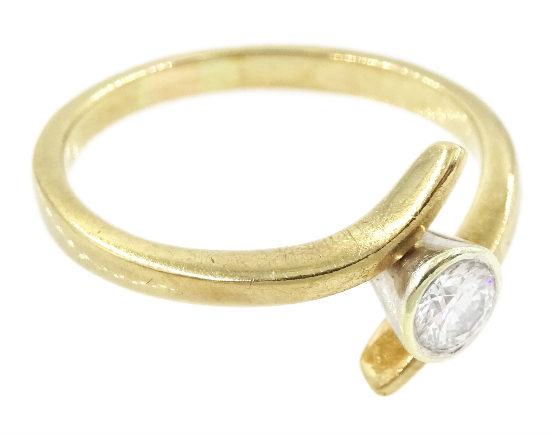 9ct gold diamond ring, single round brilliant cut diamond of approx 0.25 carat, in a crossover setting, hallmarked