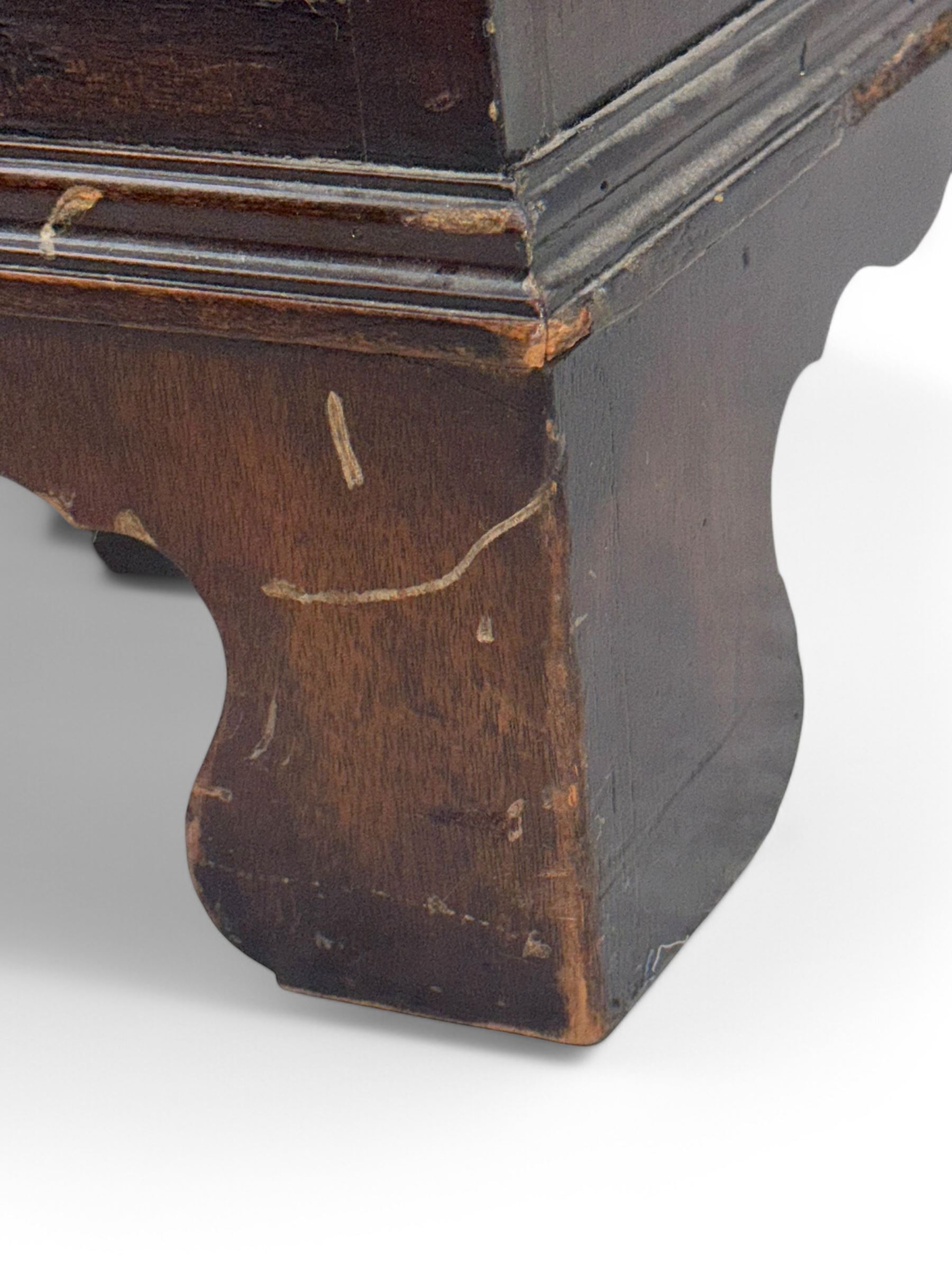 Georgian design mahogany kneehole desk, moulded rectangular top with red gilt-tooled leather writing surface, over an arrangement of nine cock-beaded drawers with brass swan neck handles, on bracket feet