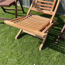 Two teak folding garden armchairs and folding lounger - THIS LOT IS TO BE COLLECTED BY APPOINTMENT FROM DUGGLEBY STORAGE, GREAT HILL, EASTFIELD, SCARBOROUGH, YO11 3TX