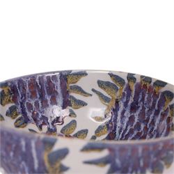 Sophie Hamilton (1963- ); Sunflower bowl, decorated with blue and purple sunflowers on a pale blue ground, with makers mark beneath, D23cm 