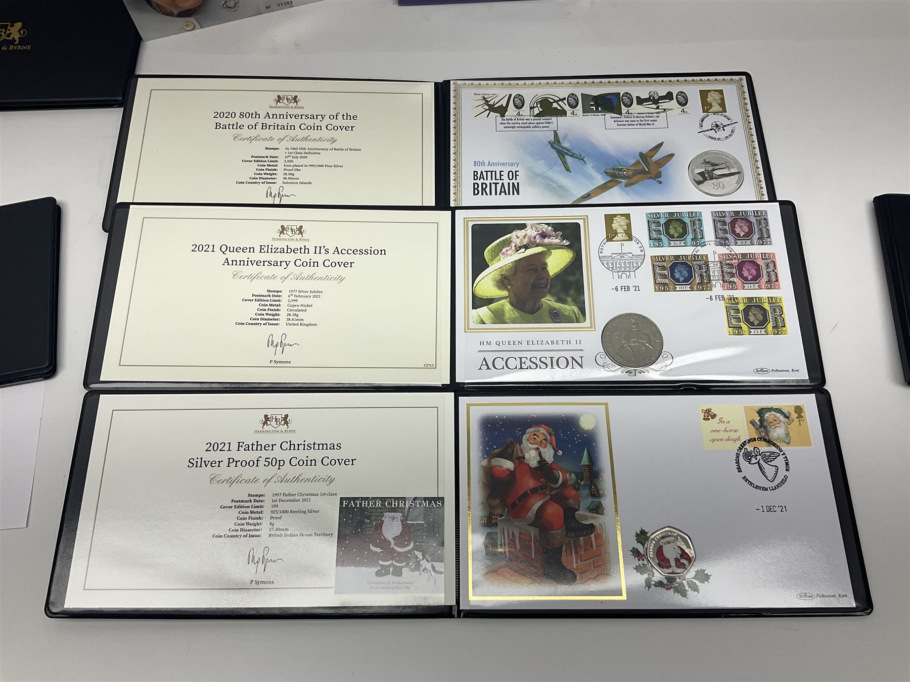 Commemorative coins and covers, including '80th Anniversary of the Battle of Britain' coin cover with Solomon Islands 2020 half dollar, 'Royal National Lifeboat Institution' coin cover with Alderney 2021 five pounds, 'Queen Elizabeth II's 95th Birthday' coin cover with Solomon Islands 2021 half dollar, other similar coin covers all in Harrington and Byrne folders, The Royal Mail 'HM The Queen's 95th Birthday' coin cover with 2021 five pounds and Queen Elizabeth II Isle of Man 2020 'Peter Pan' fifty pence coin collection in card folder