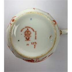  A Crown Derby Imari 2712 pattern part tea service, comprising eleven teacups, twelve saucers, twelve side plates, two serving plates, milk jug, bowl, each with printed mark to base.   