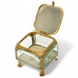 French bevelled glass bijouterie boxes, with gilt metal framing, raised on scrolled and paw feet, the square example with 'Le Hotel de Ville - Paris' scene to cover (2)