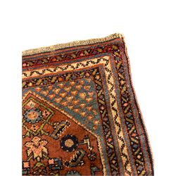 Small Persian rug or mat, decorated with Herati motifs within pattern borders 