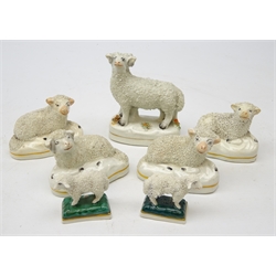  Four Victorian Staffordshire recumbent Sheep, pair miniature Sheep and another standing, L9cm (6)  