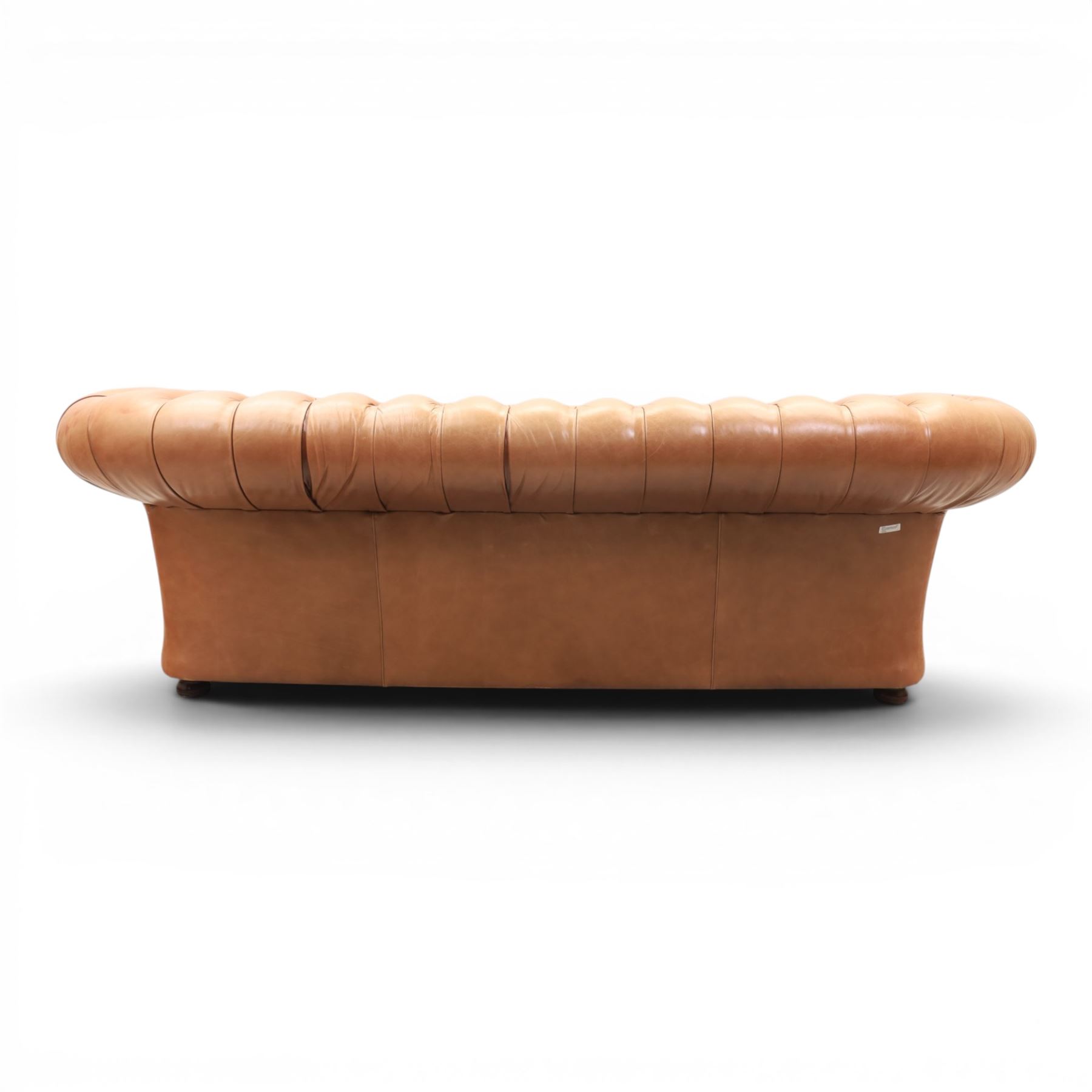 Springvale - Large three seat Chesterfield sofa, upholstered in buttoned tan leather, two cushion deep seat, turned bun feet