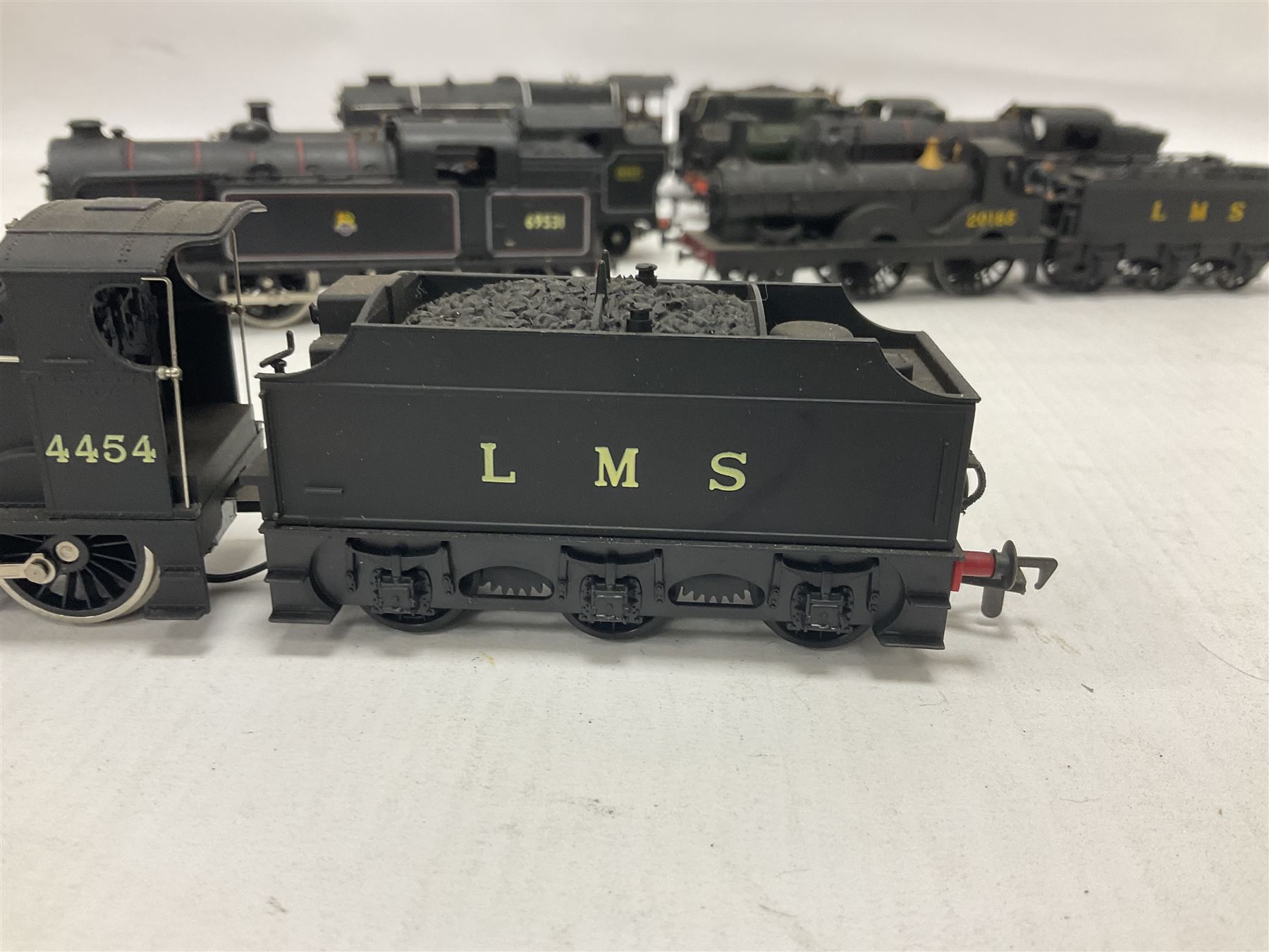 Airfix ‘00’ gauge - seven locomotives comprising Class 7P (Royal Scot) ‘Royal Scots Fusilier’ 4-6-0 no.6103 in LMS black with Mainline tender; two Class N2 0-6-2T no.69531 in BR black; Class 1282 2-4-0 no.20185 in LMS black; Class 61XX 2-6-2T no.6167 in BR black; Class 14XX 0-4-2T no.1466 in GWR green, all unboxed; Class 4F 0-6-0 no.4454 in LMS black, in original box (7)