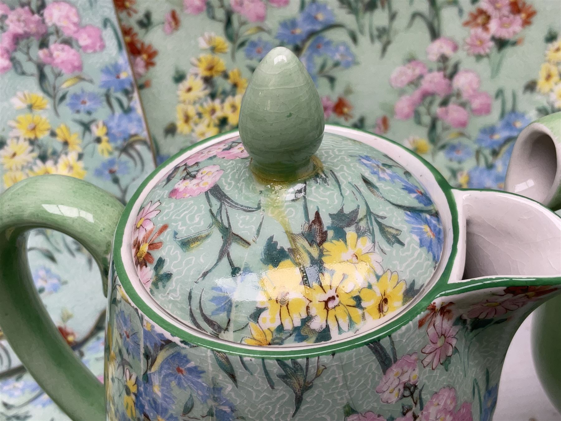 Shelley Melody pattern tea service for six, to include teapot, teapot stand, hot water jug, milk jug, covered sucrier, teacups and saucers, cake plates etc (31)