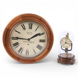 Bulle electric battery clock on a turned wooden base under dome, together with Smiths London circular wall clock