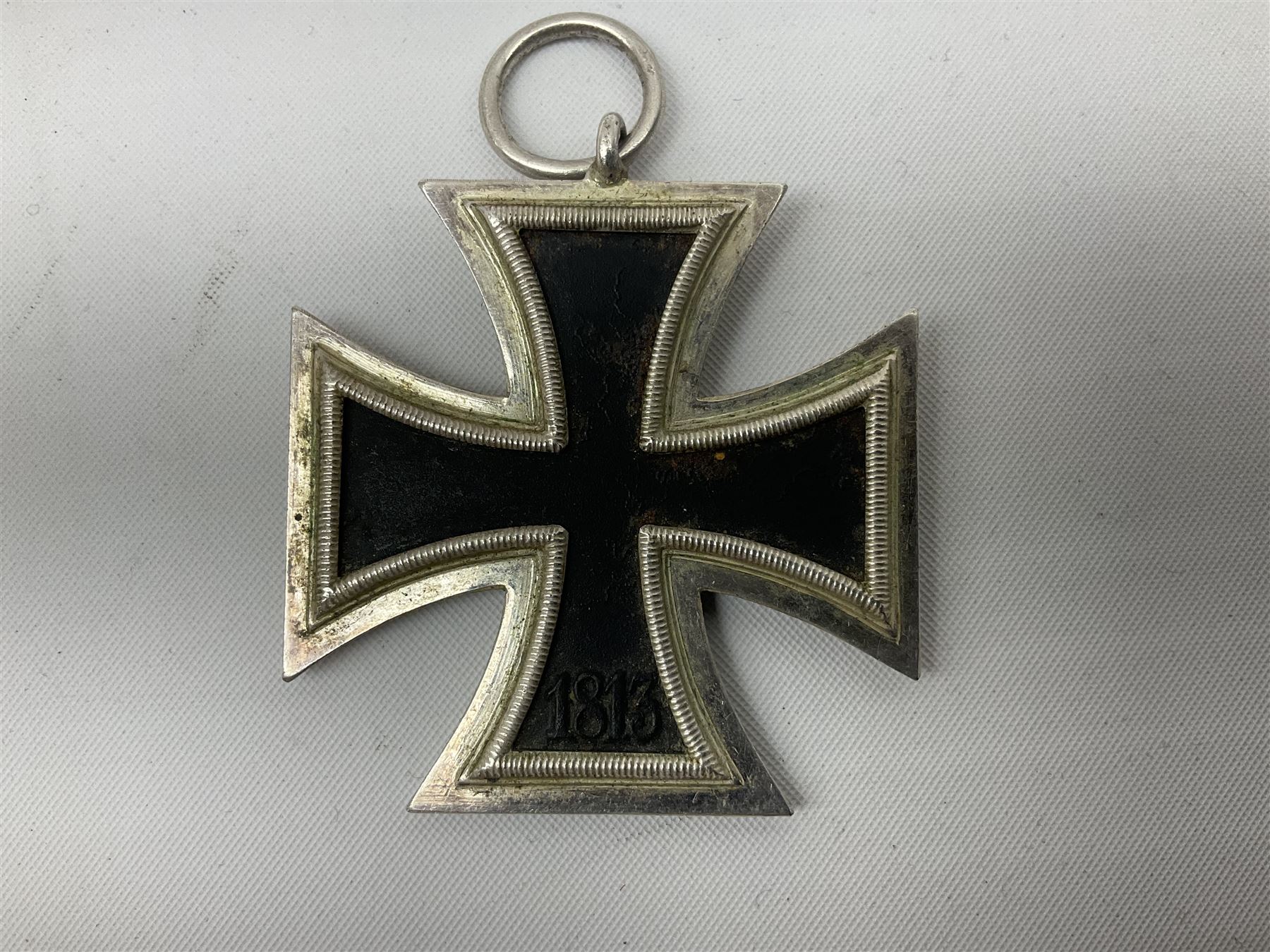WW2 German Iron Cross 1st Class, back of pin indistinctly stamped ?20; and WW2 German Iron Cross 2nd Class, ring indistinctly stamped ?100 for Rudolf Wachtler und Lange (2)