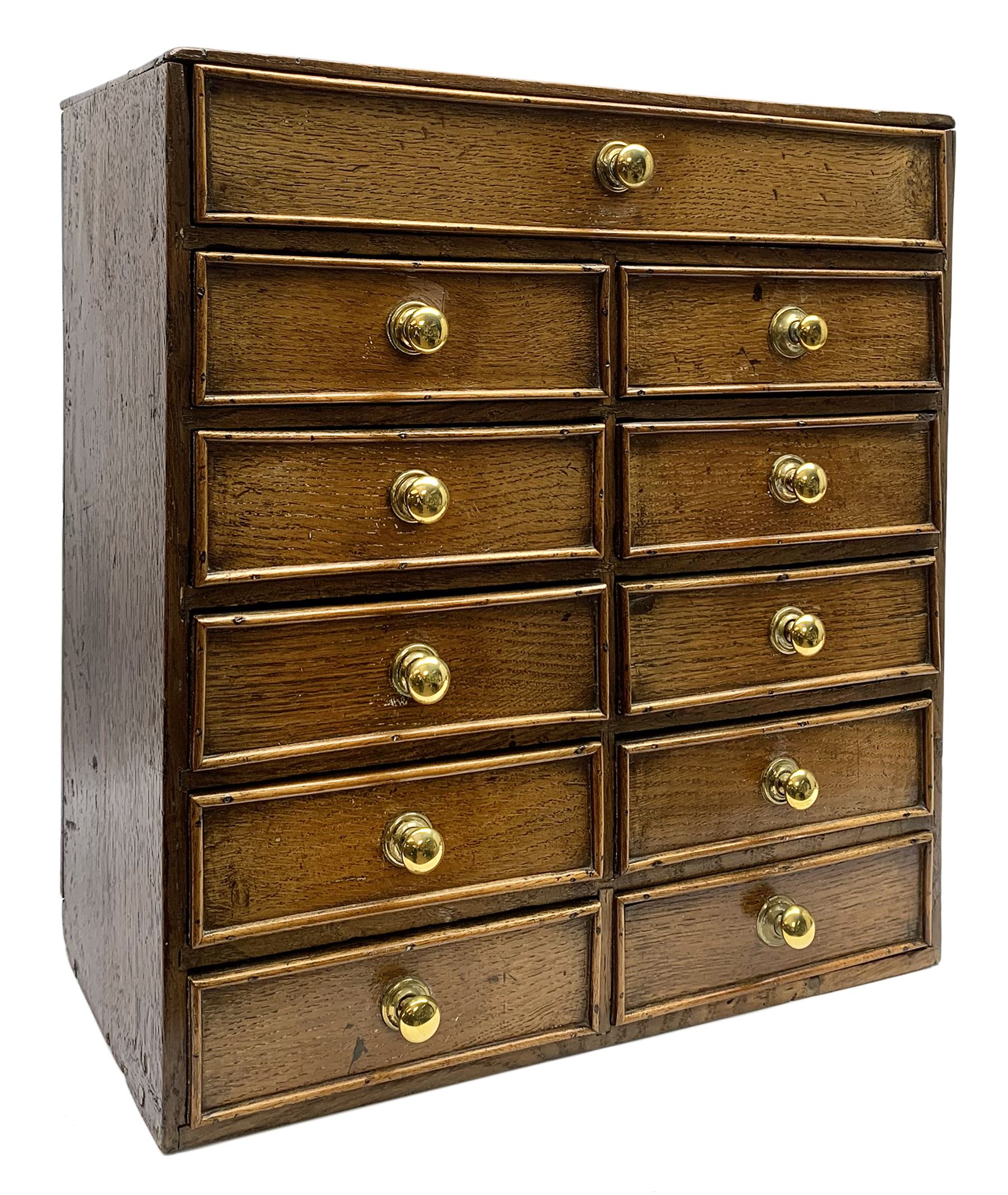 Cabinet with lots of tiny drawers discount