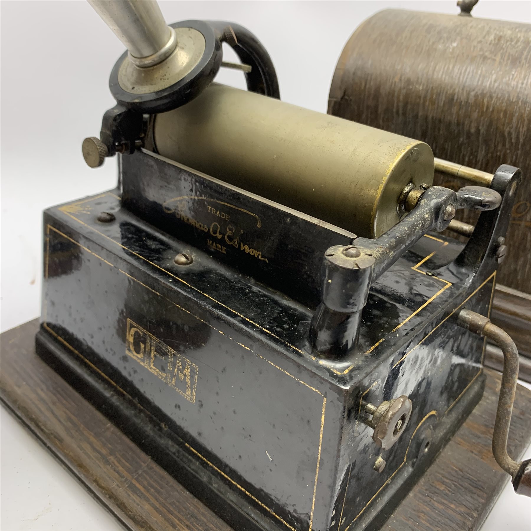  Early 20th century Edison Gem phonograph, the reproducer marked Model-C, with lift-off oak cover, Serial No.G204826, last patent date 1903, with white metal horn, W25cm, and six cylinders/boxes  