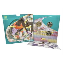 The Royal Mint Queen Elizabeth II 2002 Manchester Commonwealth Games four coin two pound coin  set in card display