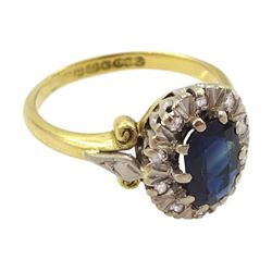 18ct gold oval cut sapphire and round brilliant cut diamond cluster ring, hallmarked