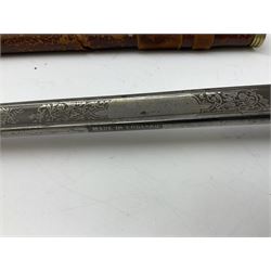 British George V 1897 Pattern Infantry Officers Sword, the 82.5cm fullered steel blade etched and polished with crowned royal arms, GRV cyphers and scrolling foliage, marked Army & Navy Co-operative Society 105 Victoria St London SW to the ricasso,  plated pierced basket hilt with wire bound fish skin grip and leather knot, No.15032; in leather covered scabbard