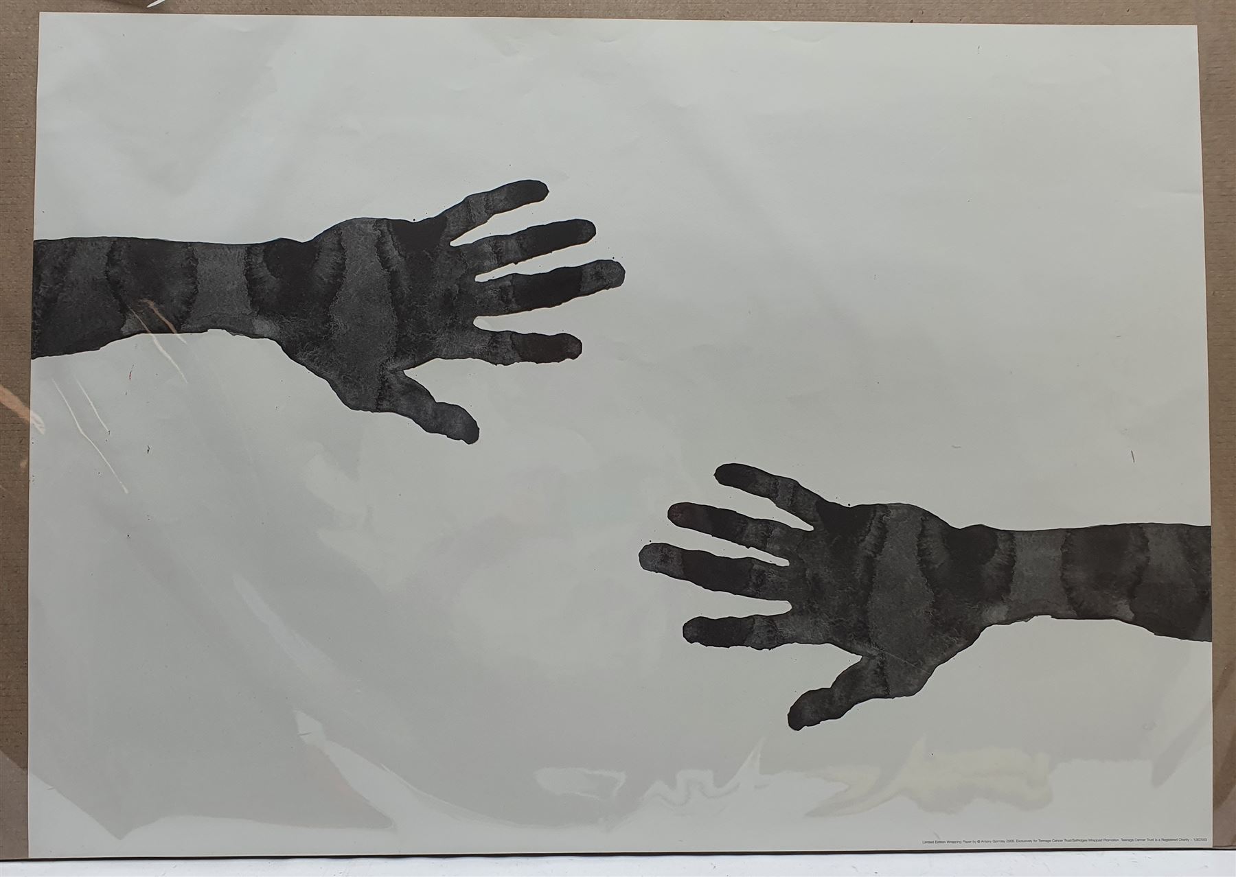 Sir Antony Gormley RA (British 1950-): 'Hands', limited edition wrapping paper sheet, produced for the Teenage Cancer Trust by Selfridges Wrapped 2005, 45cm x 70cm