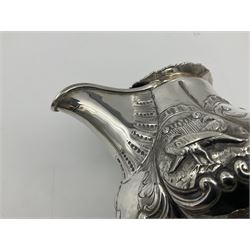 Victorian silver three piece tea service, comprising teapot, twin handled open sucrier, and milk jug, each of bellied form with acanthus capped scroll handles, the sides embossed with alternating scroll edged vacant panels and panels containing a pair of birds, upon four palmette feet, the teapot with ivory insulators to handle, and bird finial to the hinged domed cover, hallmarked William Hunter & Son, London 1861, teapot H19cm, including handles sucrier H13.5cm, including handle milk jug H12cm

This item has been registered for sale under Section 10 of the APHA Ivory Act