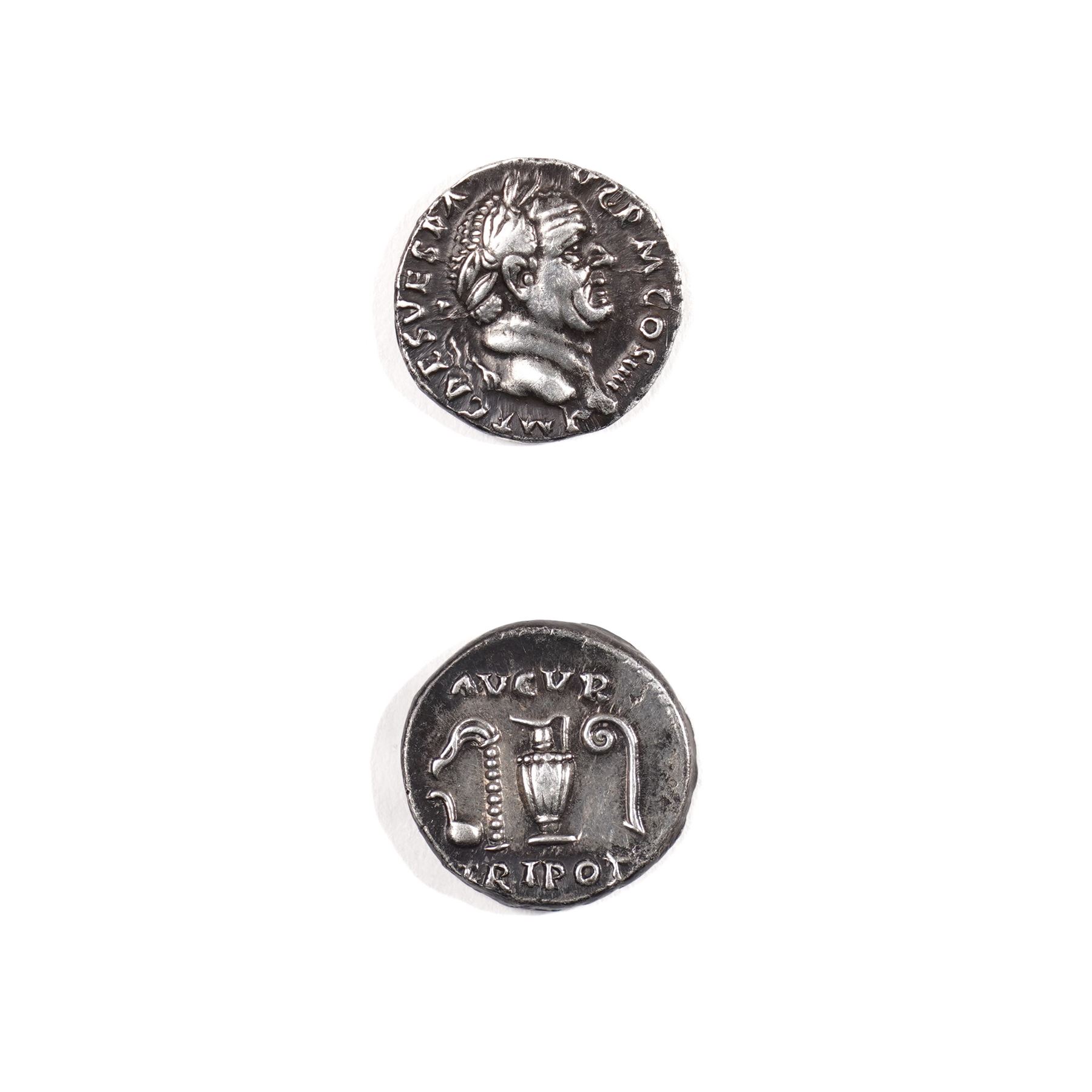 Roman Empire - Vespasian (AD 69-79): Silver Denarius coin, obverse laureate head of Vespasian right, reverse simpulum between lituus and aspergillum, AUGUR TR POT; AD 75-79, Rome mint