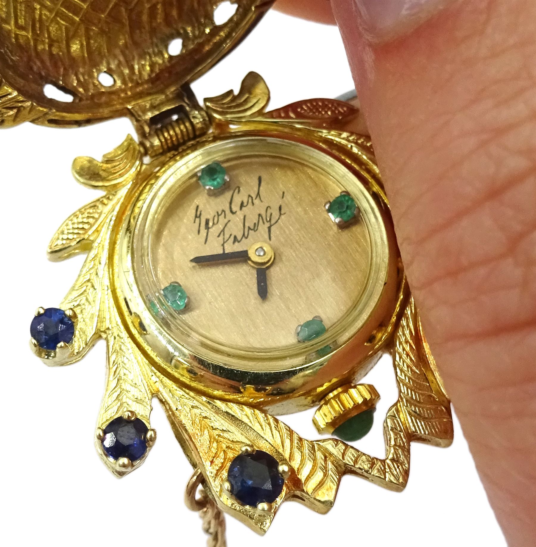  Igor Carl Faberge for Franklin Mint 14ct gold peacock watch pendant necklace, the peacock wings diamond, enamel and sapphire set, with a single suspended pearl, the back with hidden quartz watch, boxed