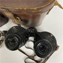Pair of racing binoculars in leather case, together with a pair of Ross London Steplux binoculars no.149664 in leather case  