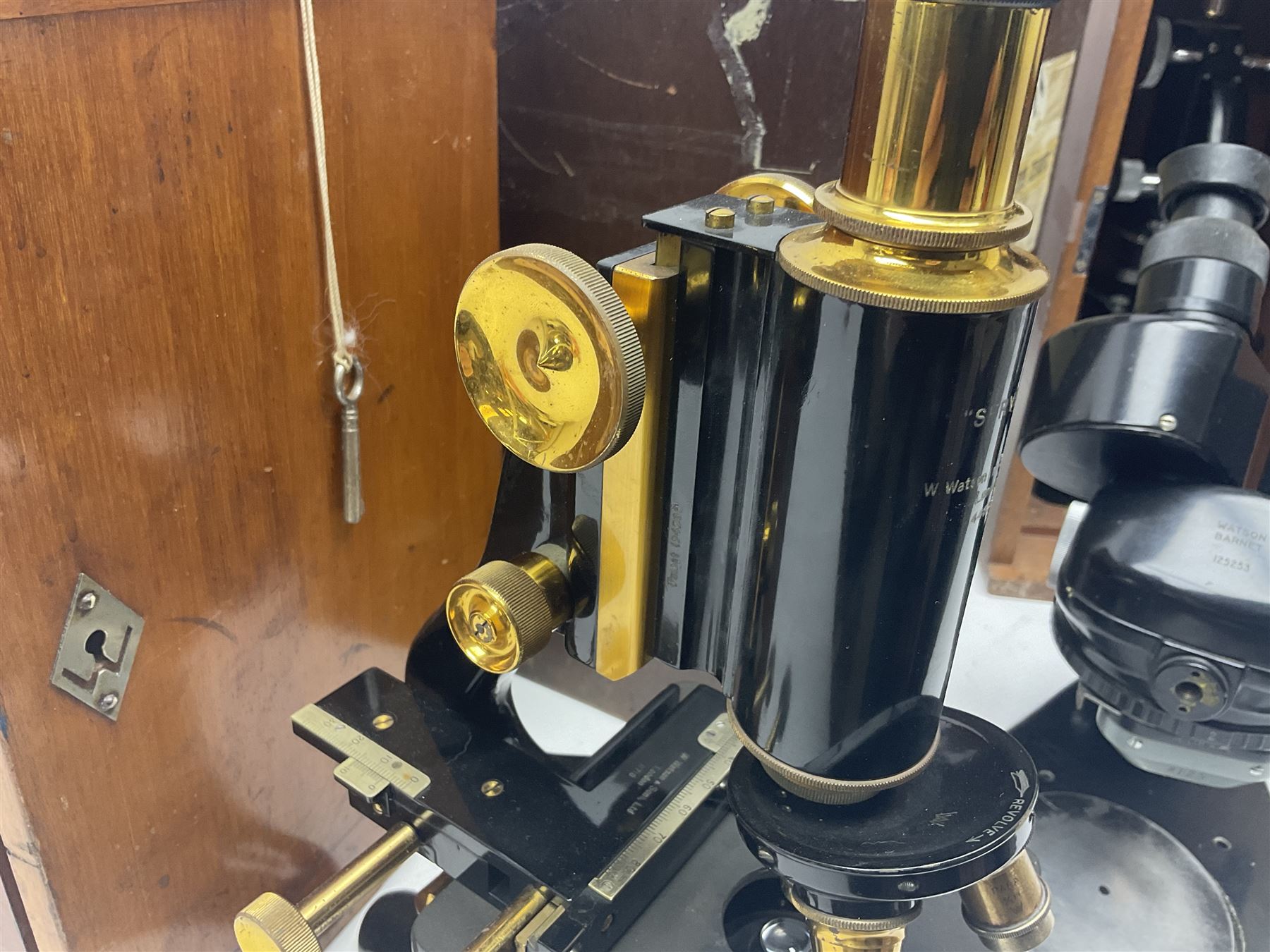 Three W. Watson & Sons microscopes, comprising Barnet binocular no 125253, Kima no 123196 and Service no 44858, all boxed 