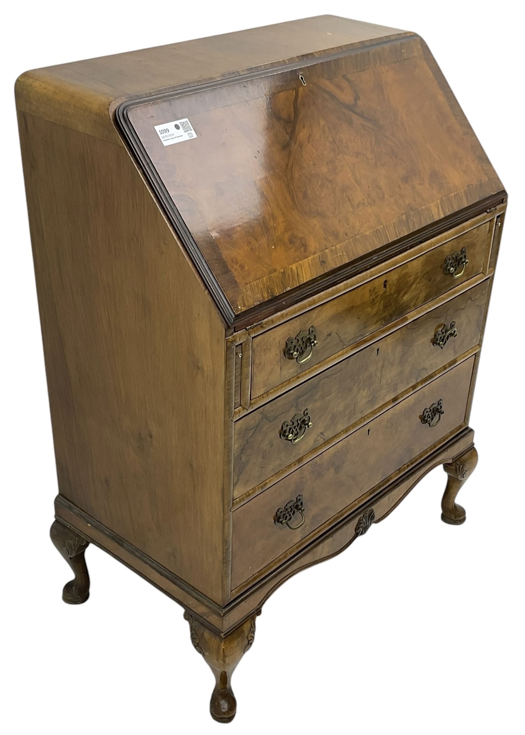 Mid-20th century walnut bureau desk, figured fall front enclosing fitted interior, three graduating drawers below, on cabriole feet