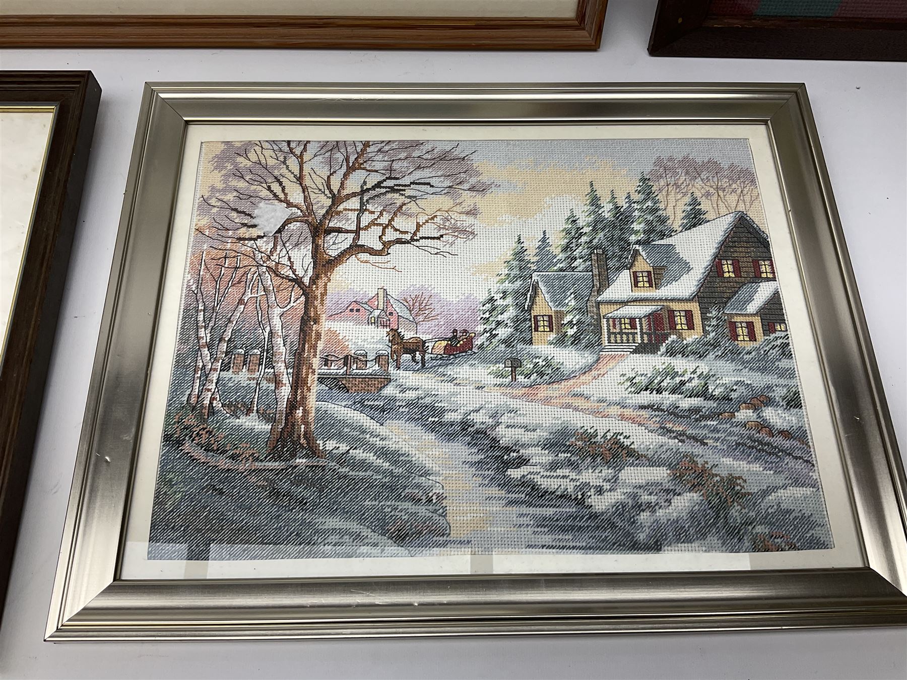 After Claude Monet (French 1840 - 1926): 'San Giorgio Maggiore', colour print; After Adolf Sehring (American 1930-): Summer Daydream, textured print; after John Trickett (British 1952-): Spaniel Puppy, colour print signed together with two needleworks (5)