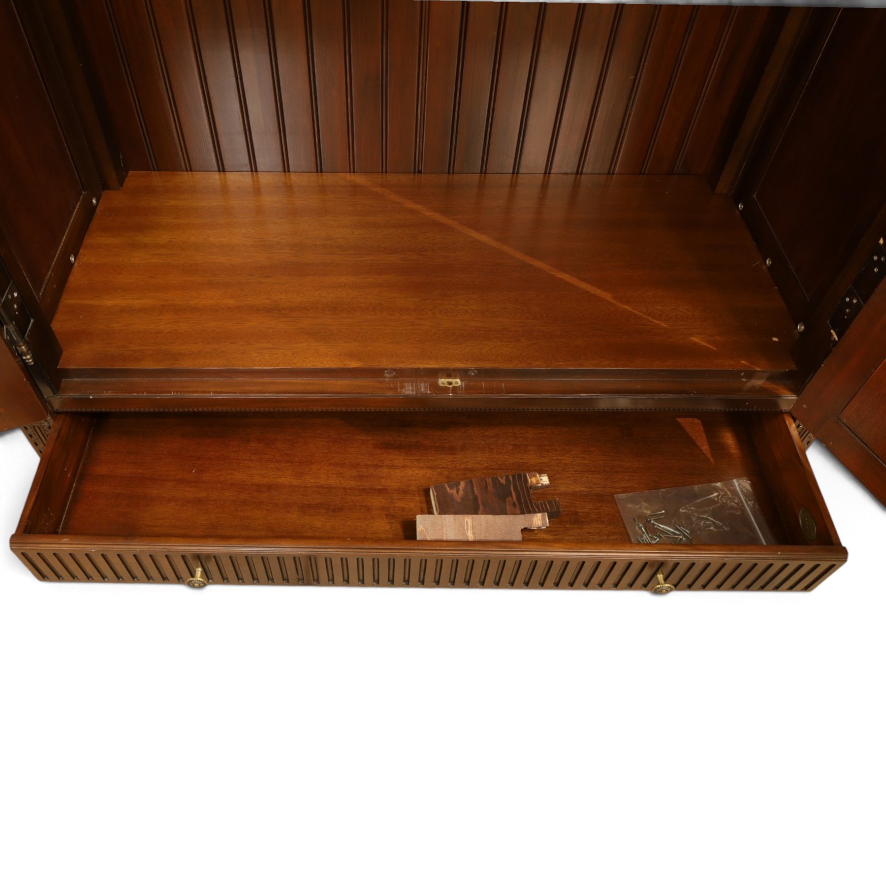 And So To Bed - French design ‘Eclectic’ double wardrobe in dark finish, arched moulded cornice with carved foliate band and turned finials, two mirrored doors enclosing a hanging rail, flanked by turned columns with foliate decoration, single fluted drawer below, on turned tapering feet